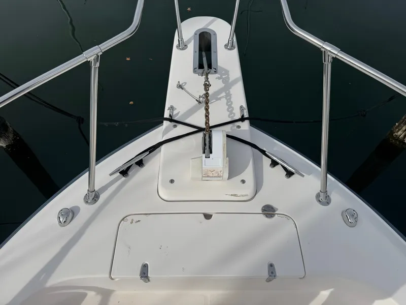 Slide: The Image of Bow of 2004 Grady-White Marlin 300 with anchor and railing. - 31