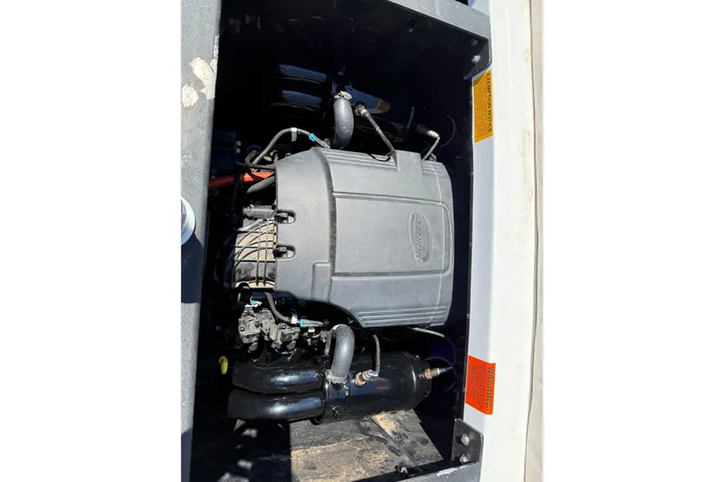 Slide: The Image of 2011 Malibu Wakesetter 247 LSV engine compartment, showcasing detailed components and layout. - 9