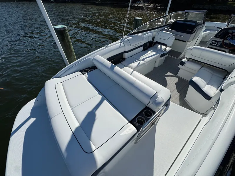 Slide: The Image of 2014 Formula 270 Bowrider with spacious seating and sleek design on the water. - 20