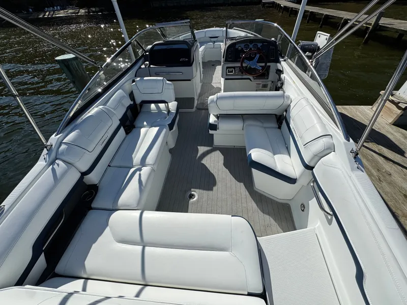 Slide: The Image of 2014 Formula 270 Bowrider boat interior with spacious seating and modern design. - 21