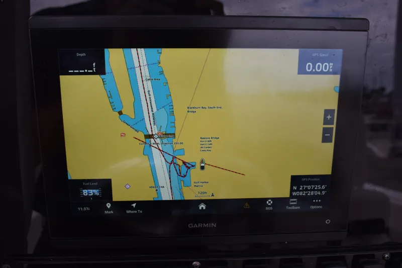 Slide: The Image of Garmin navigation display on 2023 Sea Hunt Ultra 255 SE boat, showing map and GPS data. - 25