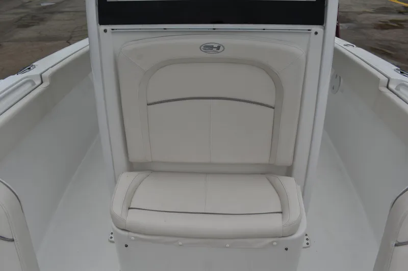 Slide: The Image of 2023 Sea Hunt Ultra 255 SE boat seat, white upholstery, sleek design. - 42
