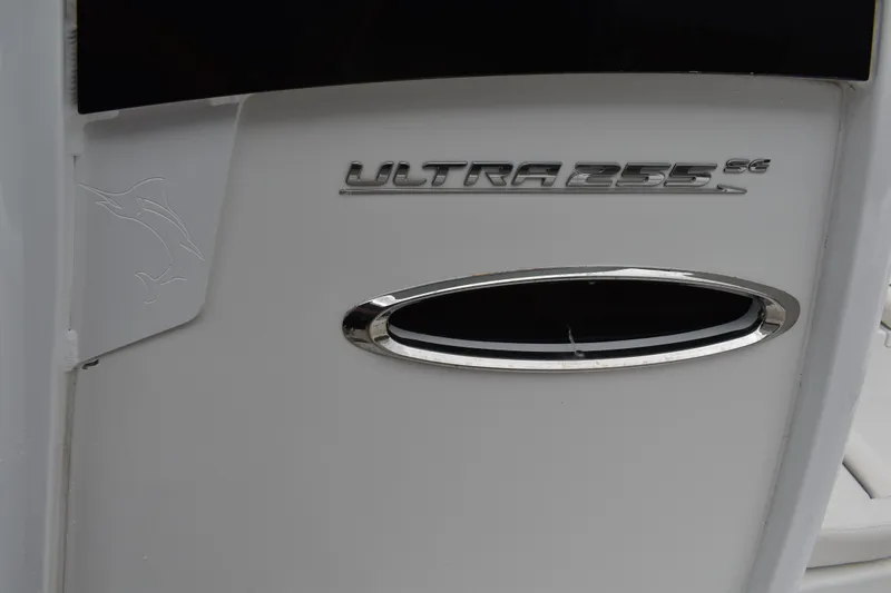 Slide: The Image of 2023 Sea Hunt Ultra 255 SE boat emblem and design detail. - 44