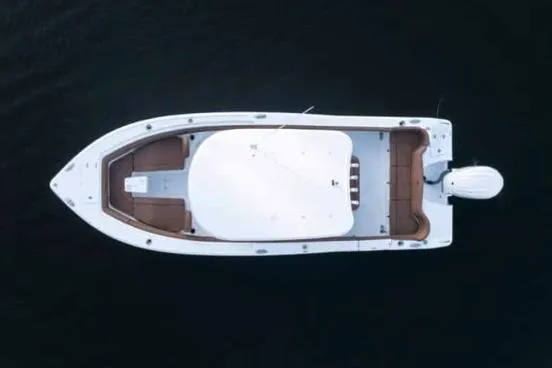Slide: The Image of Aerial view of 2023 Sea Hunt Ultra 255 SE boat on dark water. - 56