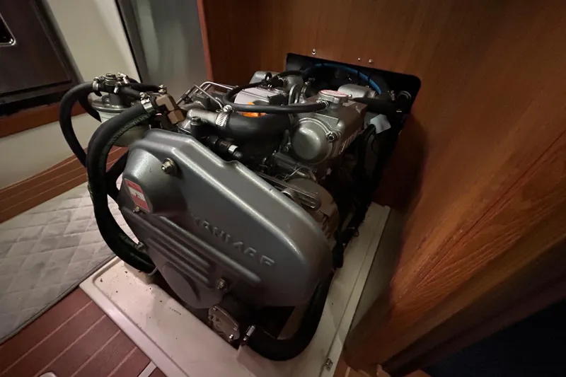 Slide: The Image of Engine compartment of a 2009 Catalina 375 sailboat, featuring a Yanmar engine. - 29