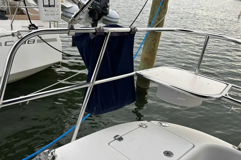 Slide: The Image of Catalina 375 sailboat stern view with railing and water backdrop, 2009 model. - 37