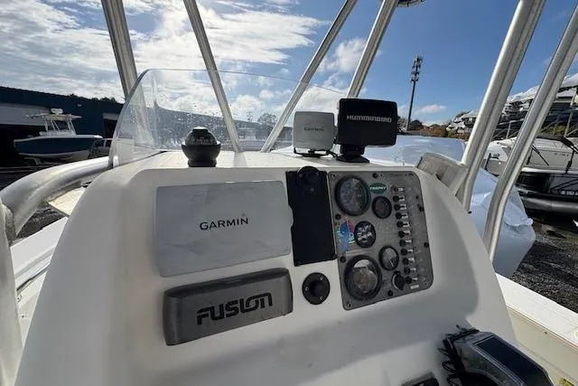 Slide: The Image of 2006 Trophy PRO 23 Center Console dashboard with Garmin and Humminbird electronics. - 7