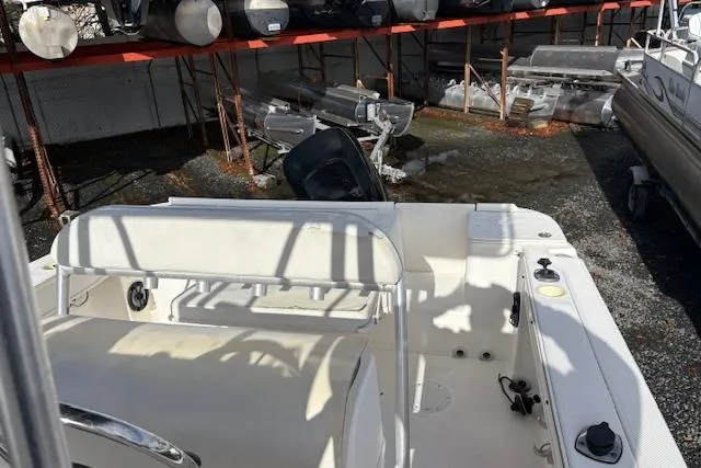 Slide: The Image of 2006 Trophy PRO 23 Center Console boat in storage yard, viewed from rear deck. - 9