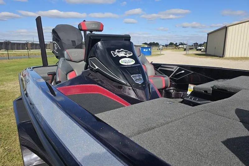 Slide: The Image of 2019 Skeeter FX21 bass boat with sleek design and comfortable seating. - 4