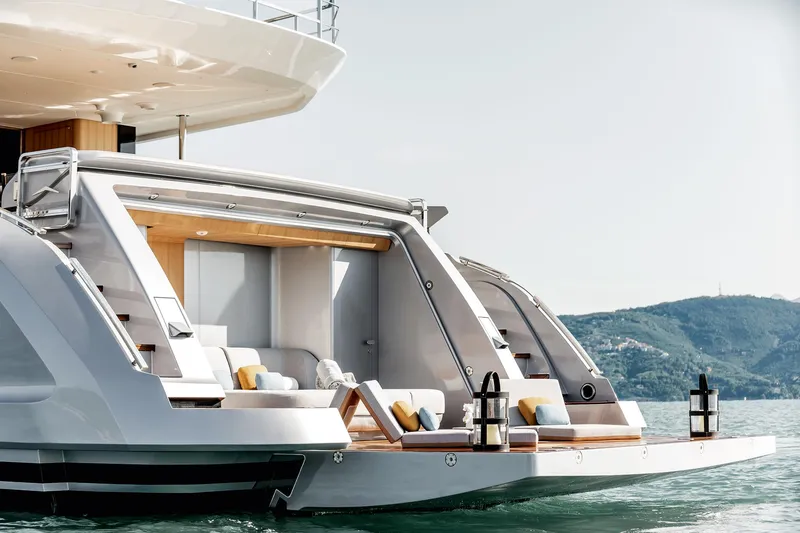 Slide: The Image of 2024 Azimut Grande 36M yacht with luxurious deck, modern design, and scenic ocean backdrop. - 10
