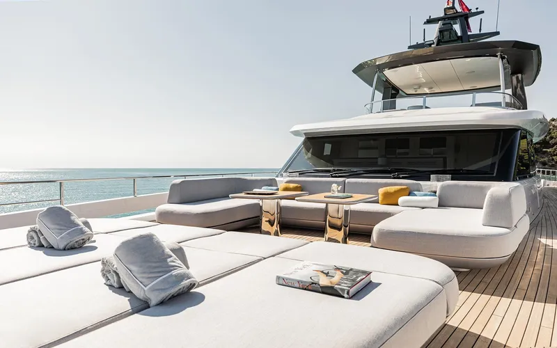 Slide: The Image of Luxurious 2024 Azimut Grande 36M yacht deck with elegant seating and ocean view. - 12