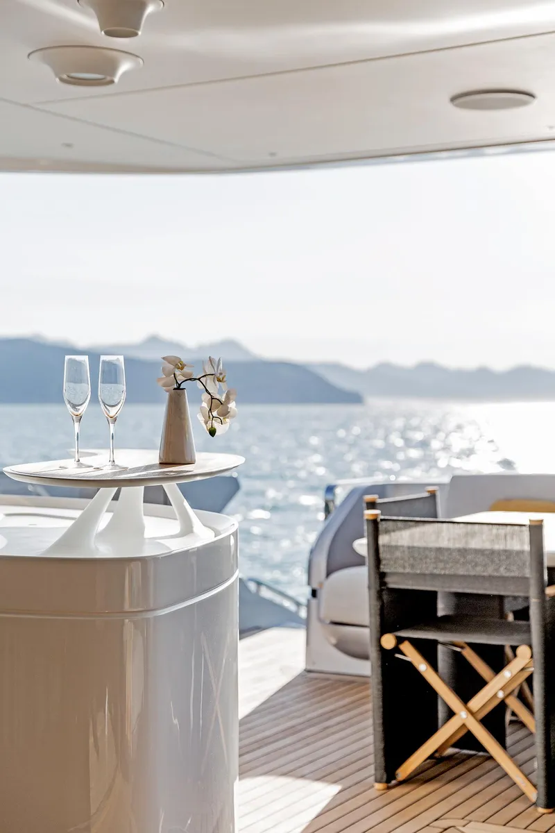 Slide: The Image of Luxury yacht Azimut Grande 36M 2024, elegant deck with ocean view and stylish seating. - 15