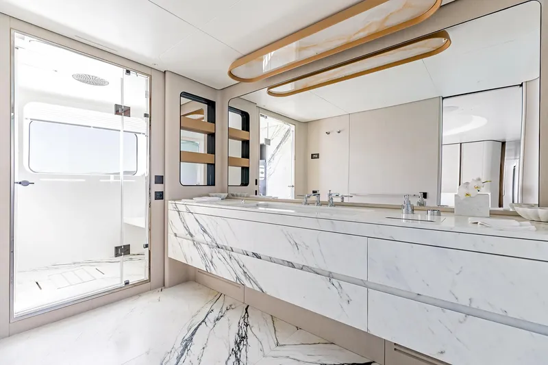 Slide: The Image of Luxurious bathroom interior of 2024 Azimut Grande 36M yacht with marble finishes. - 24