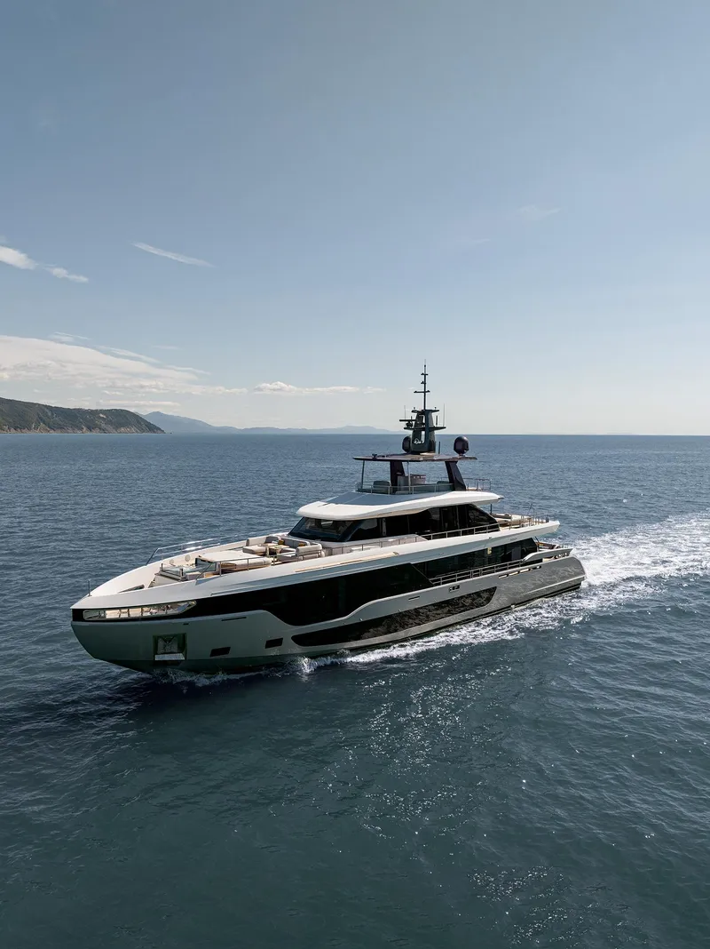 Slide: The Image of 2024 Azimut Grande 36M yacht cruising on open sea under clear sky. - 38