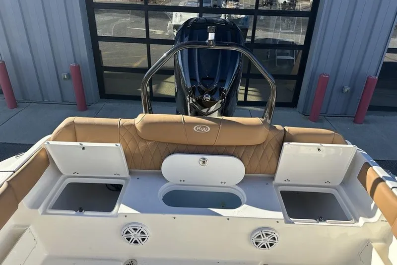 Slide: The Image of 2026 Key West 239 FSR boat with powerful 350 V6 4.3L engine, rear view. - 5