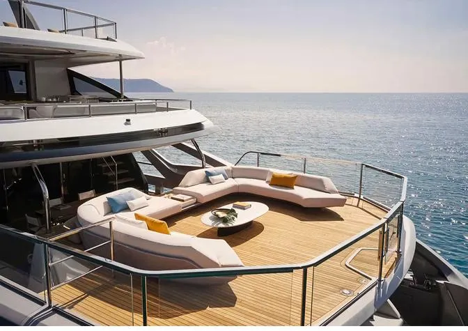 Slide: The Image of Luxurious 2027 Azimut 38M Grande Trideck yacht with elegant deck seating and ocean view. - 5