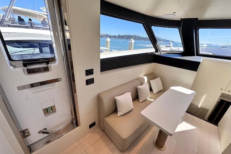 Slide: The Image of Interior of 2026 Azimut Grande Magellano 25 Metri yacht with seating and ocean view. - 18