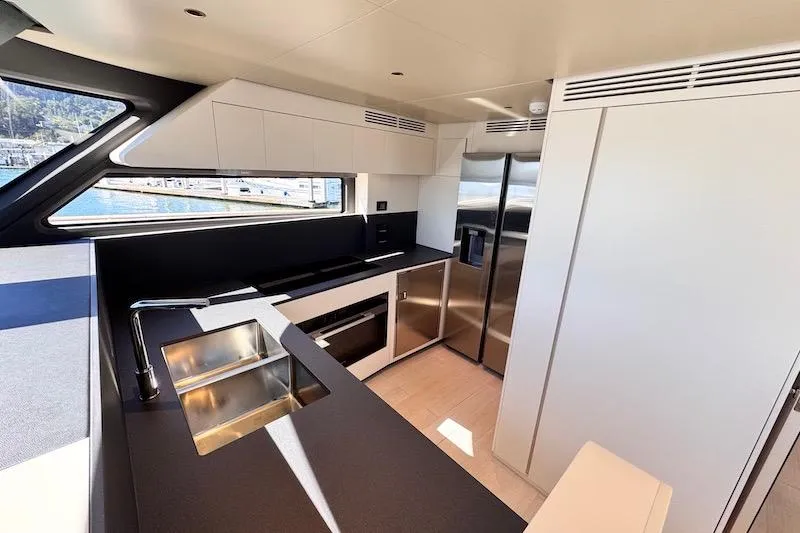 Slide: The Image of Modern kitchen interior of 2026 Azimut Grande Magellano 25 Metri yacht, featuring sleek design. - 19