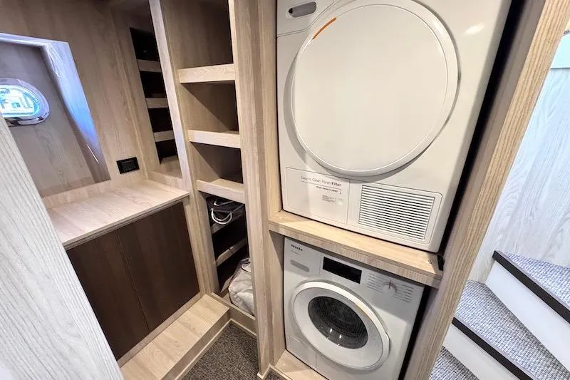 Slide: The Image of Laundry area in 2026 Azimut Grande Magellano 25 Metri yacht with washer and dryer. - 24