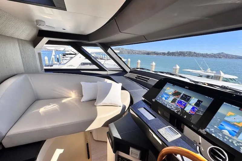 Slide: The Image of Luxurious interior of 2026 Azimut Grande Magellano 25 Metri yacht with modern navigation screens. - 31