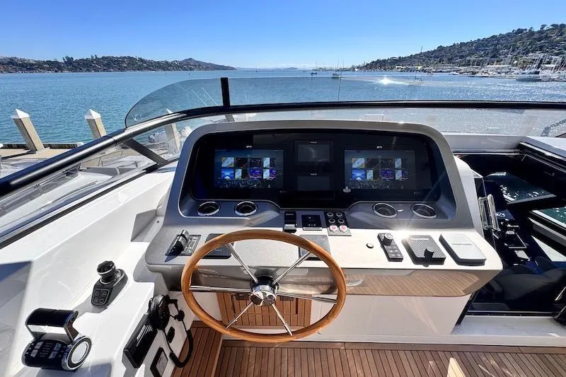 Slide: The Image of Helm of 2026 Azimut Grande Magellano 25 Metri yacht with modern navigation displays. - 36