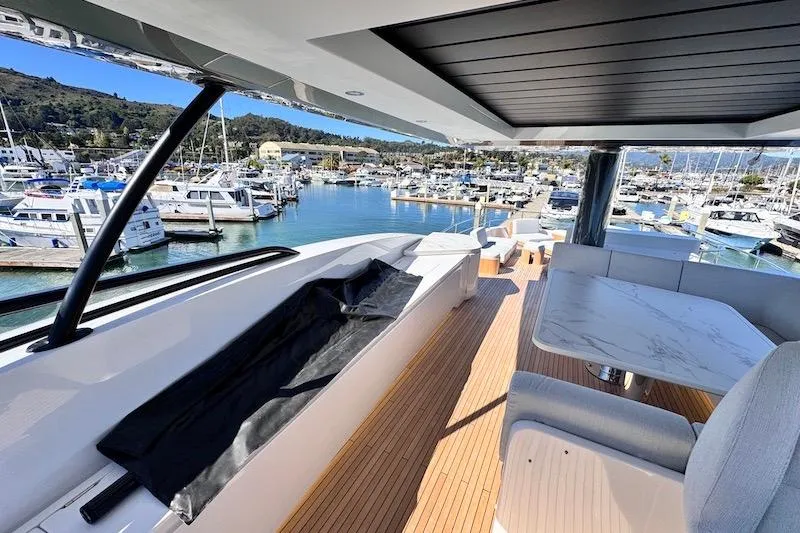 Slide: The Image of Luxurious Azimut Grande Magellano 25 Metri yacht deck with marina view, 2026 model. - 38