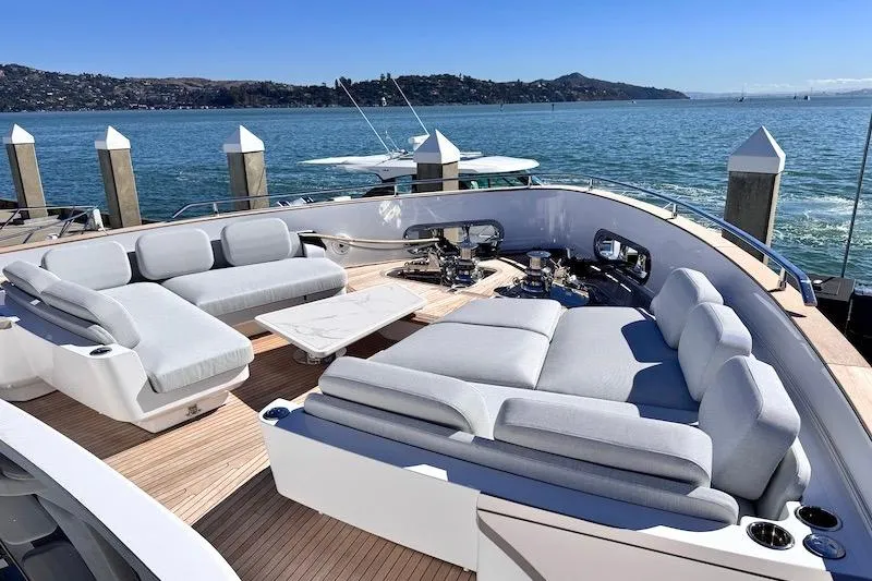 Slide: The Image of Luxurious 2026 Azimut Grande Magellano 25 Metri yacht with elegant outdoor seating area. - 4