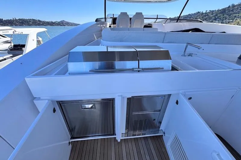 Slide: The Image of Luxurious outdoor kitchen on 2026 Azimut Grande Magellano 25 Metri yacht, featuring sleek appliances. - 45