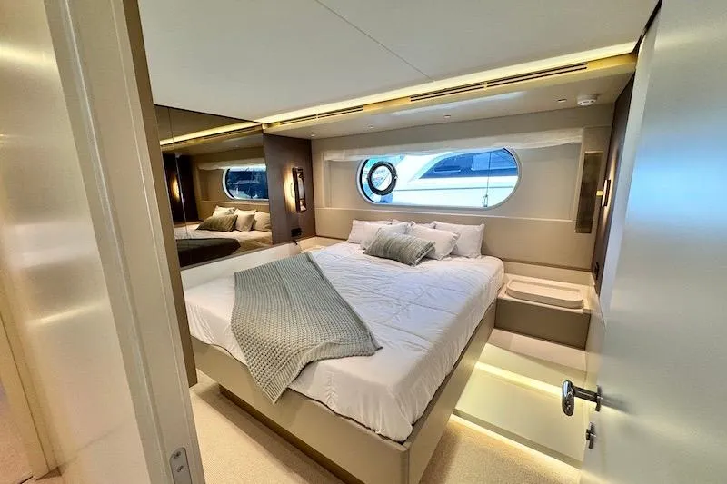 Slide: The Image of Luxurious bedroom interior of 2026 Azimut Grande Magellano 25 Metri yacht, featuring elegant design. - 55