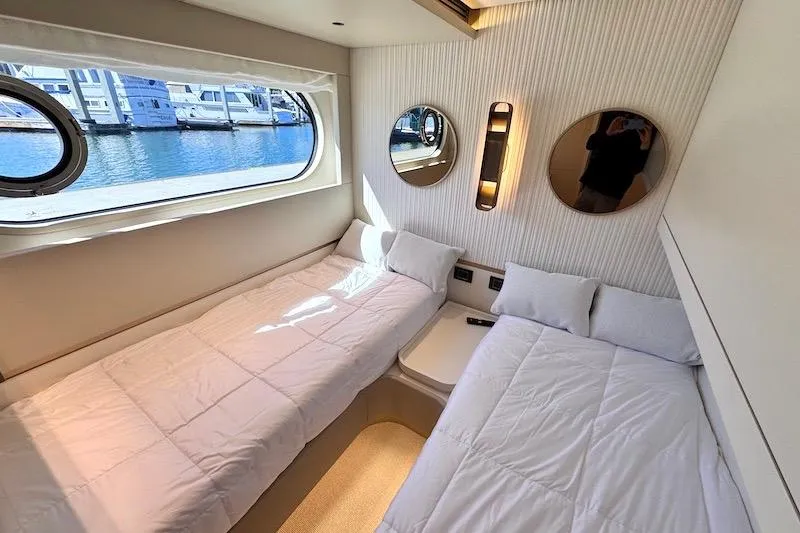 Slide: The Image of Luxurious cabin interior of 2026 Azimut Grande Magellano 25 Metri yacht with twin beds. - 60