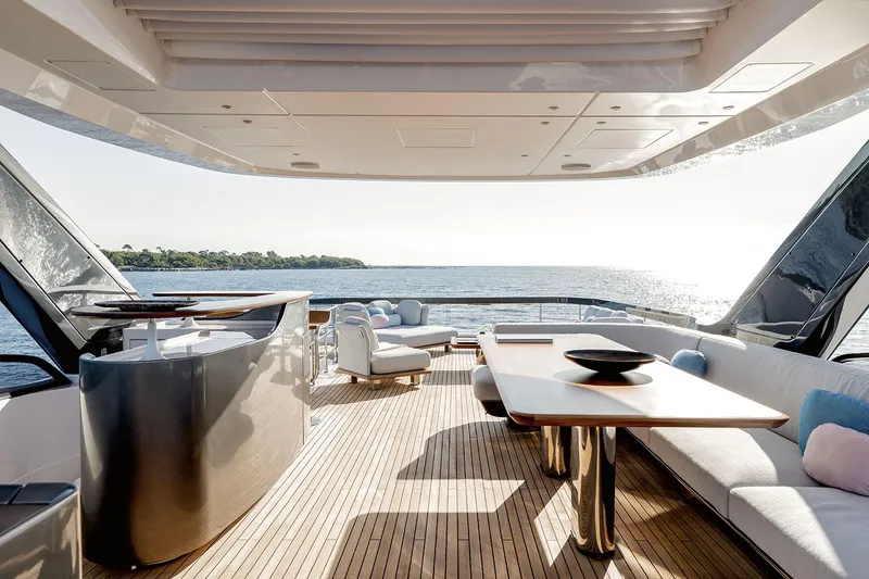 Slide: The Image of Luxurious 2025 Azimut Grande 26M yacht interior with elegant seating and ocean view. - 41
