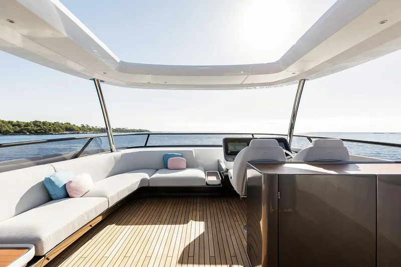 Slide: The Image of Luxurious 2025 Azimut Grande 26M yacht interior with sleek seating and ocean view. - 43