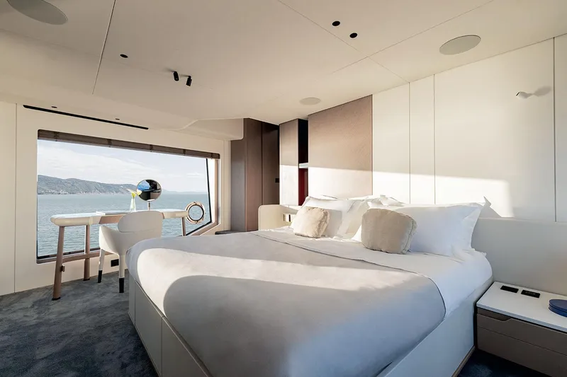 Slide: The Image of Luxurious bedroom interior of 2025 Azimut Grande 26M yacht with ocean view. - 49