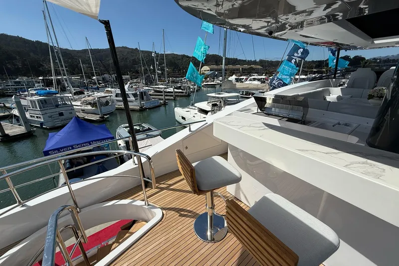 Slide: The Image of Luxurious Azimut Magellano 25M yacht interior with marina view, 2026 model. - 106