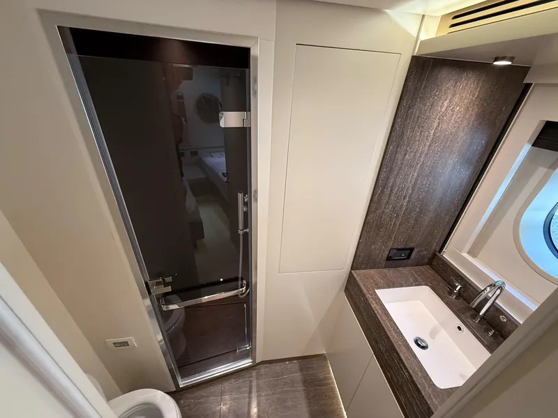 Slide: The Image of Luxurious bathroom interior of 2026 Azimut Magellano 25M yacht with modern fixtures. - 15