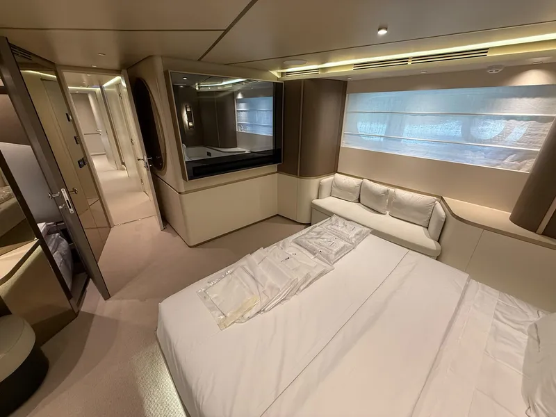 Slide: The Image of Luxurious interior of 2026 Azimut Magellano 25M yacht, featuring elegant bedroom design. - 21