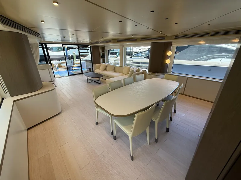 Slide: The Image of Luxurious interior of 2026 Azimut Magellano 25M yacht with dining area and seating. - 30