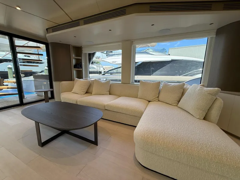 Slide: The Image of Luxurious interior of 2026 Azimut Magellano 25M yacht with plush seating and modern design. - 33