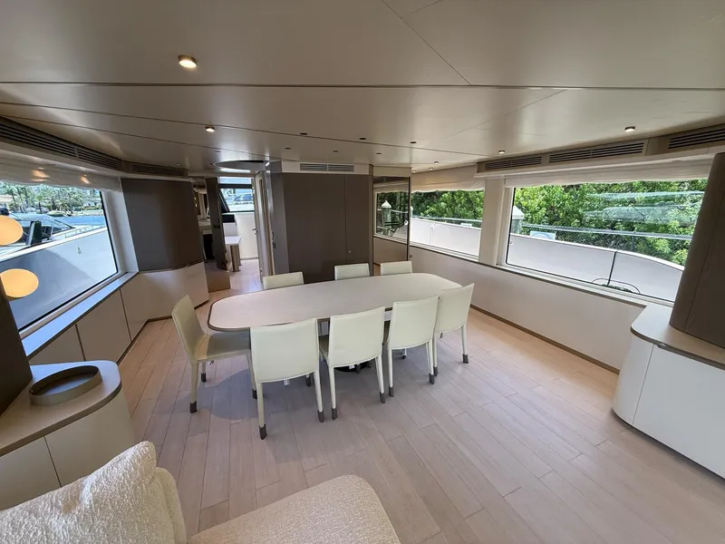 Slide: The Image of Luxurious interior of 2026 Azimut Magellano 25M yacht with elegant dining area. - 35