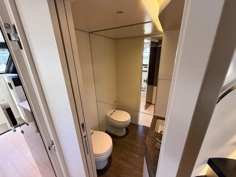 Slide: The Image of Luxurious bathroom interior of 2026 Azimut Magellano 25M yacht, featuring modern fixtures and elegant design. - 38