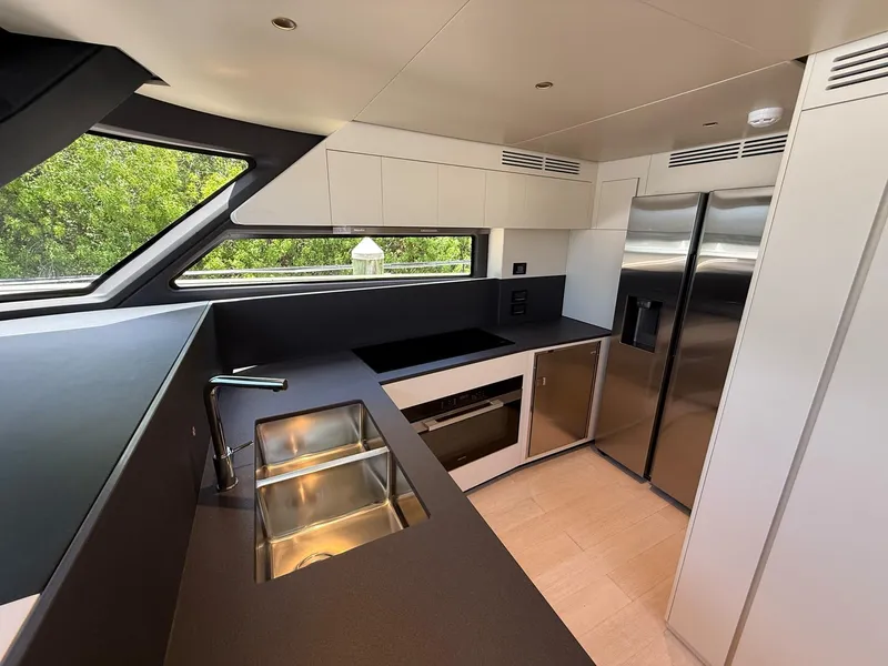 Slide: The Image of Modern kitchen interior of 2026 Azimut Magellano 25M yacht with sleek appliances and fixtures. - 41