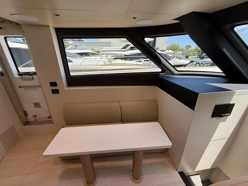Slide: The Image of Interior of 2026 Azimut Magellano 25M yacht with seating and table. - 43