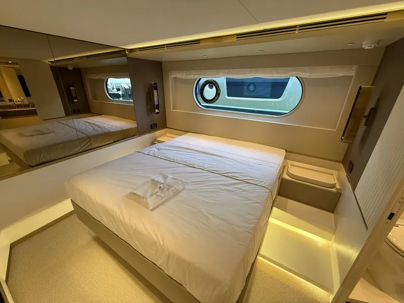 Slide: The Image of Luxurious bedroom interior of 2026 Azimut Magellano 25M yacht with modern design. - 9