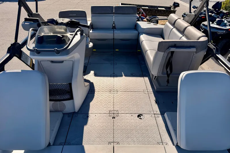 Slide: The Image of 2022 Seadoo Sport boat interior with spacious seating and modern dashboard. - 5