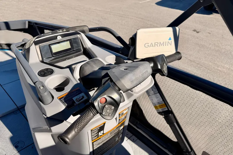 Slide: The Image of 2022 Seadoo Sport dashboard with Garmin navigation system, featuring handlebars and control panel. - 7