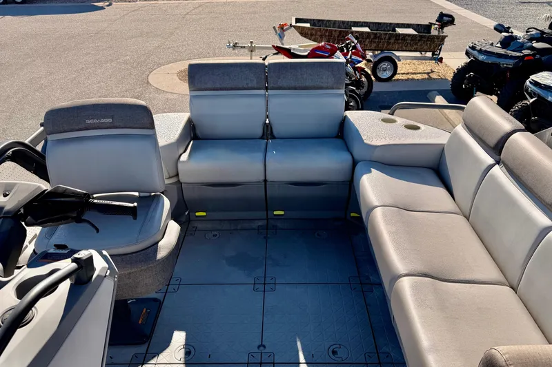 Slide: The Image of 2022 Seadoo Sport boat interior with spacious seating and modern design. - 9