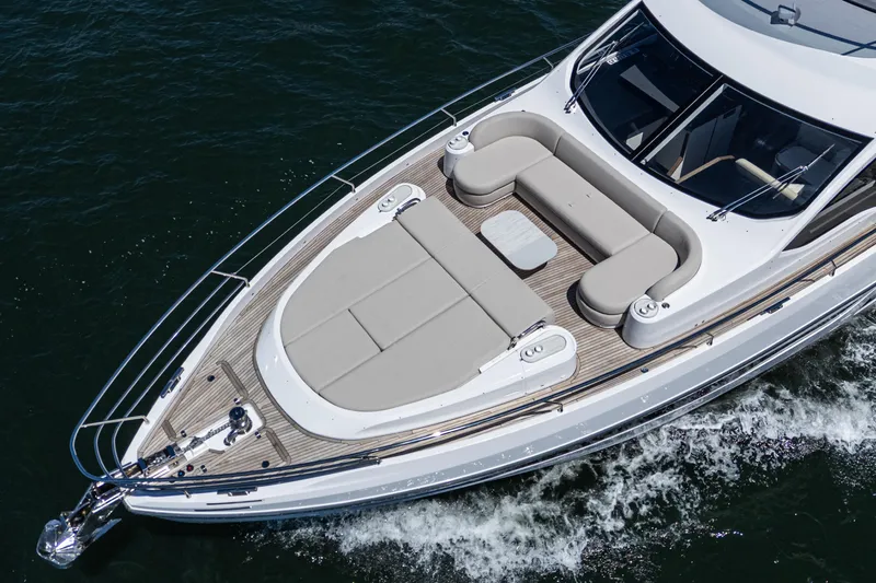 Slide: The Image of 2026 Azimut Fly 72 yacht with elegant deck seating cruising on water. - 19
