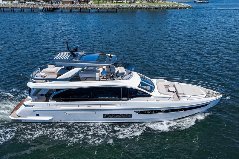 Slide: The Image of Luxurious 2026 Azimut Fly 72 yacht cruising on open water. - 3