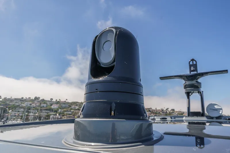 Slide: The Image of Close-up of advanced navigation equipment on 2026 Azimut Fly 72 yacht under clear blue sky. - 33