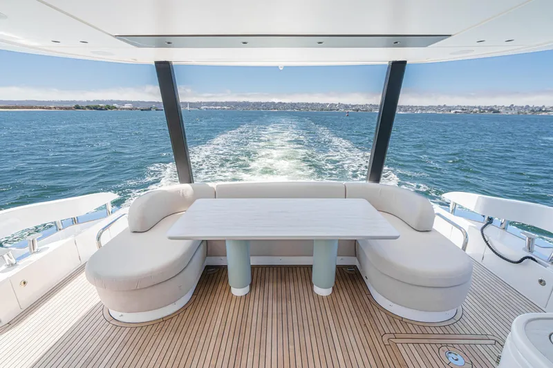 Slide: The Image of Luxurious Azimut Fly 72 yacht deck with elegant seating, cruising on open water, 2026 model. - 39